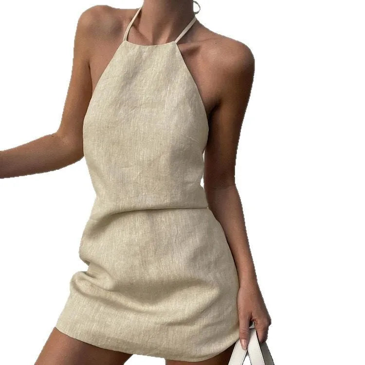 Solid colour linen A-line dress for women on a hanger.