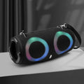 Portable Bluetooth speaker with RGB lights in multiple colour options on a strap.