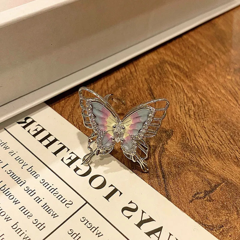 Adjustable copper butterfly women's ring with open-loop design in selected colour option