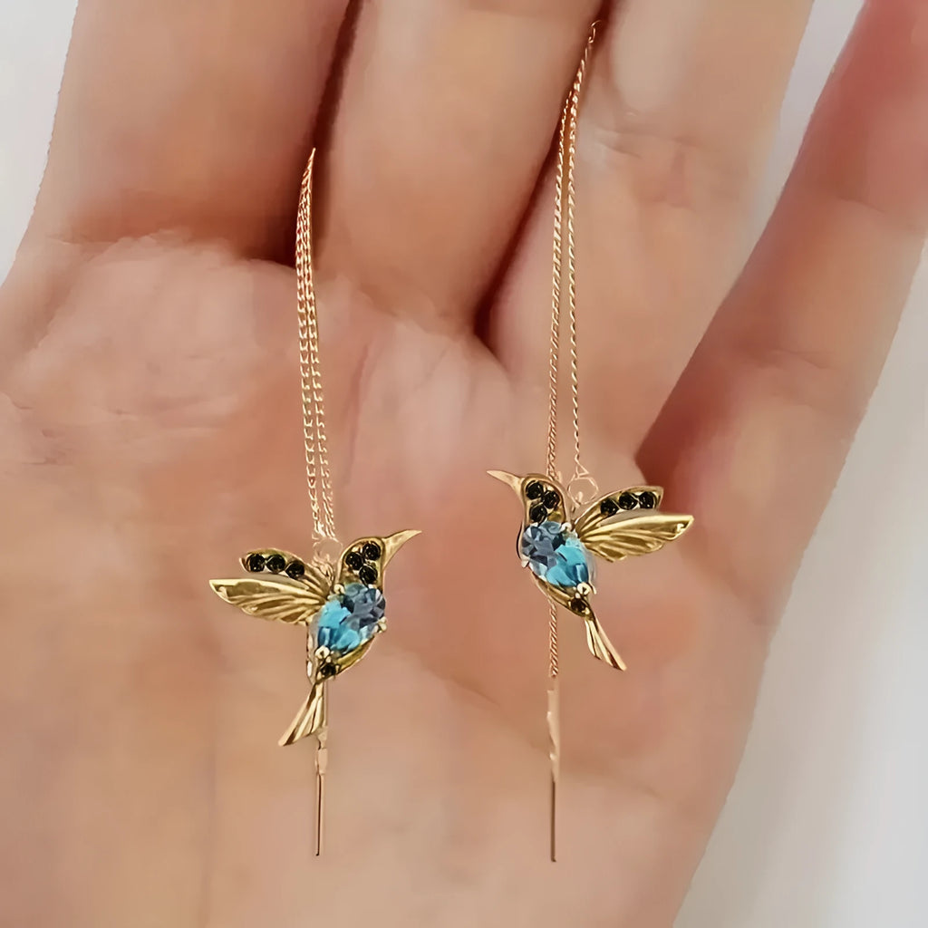 Long drop bird earrings for women with zirconium wings in blue, red, or red lvzuan colours.