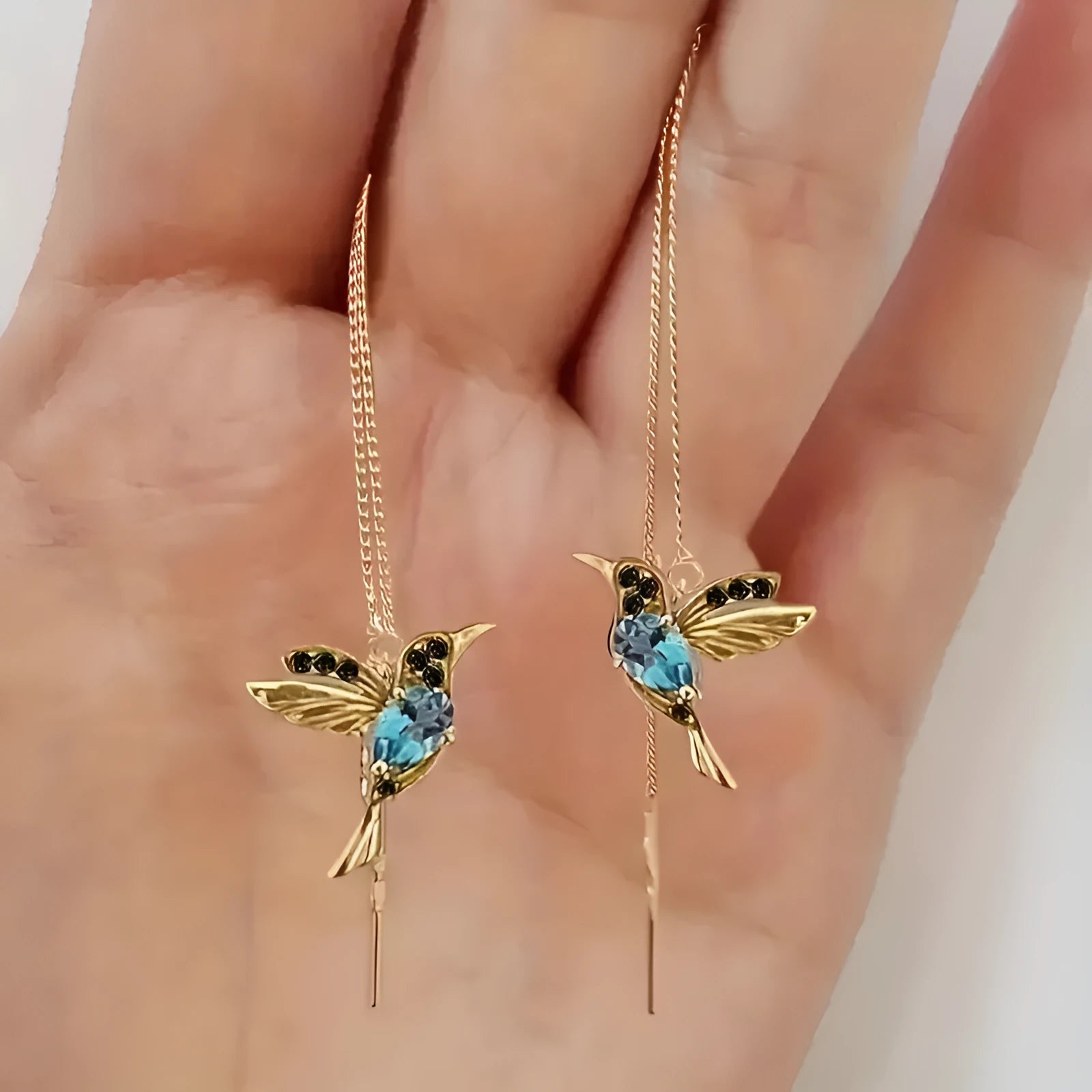Long drop bird earrings for women with zirconium wings in blue, red, or red lvzuan colours.