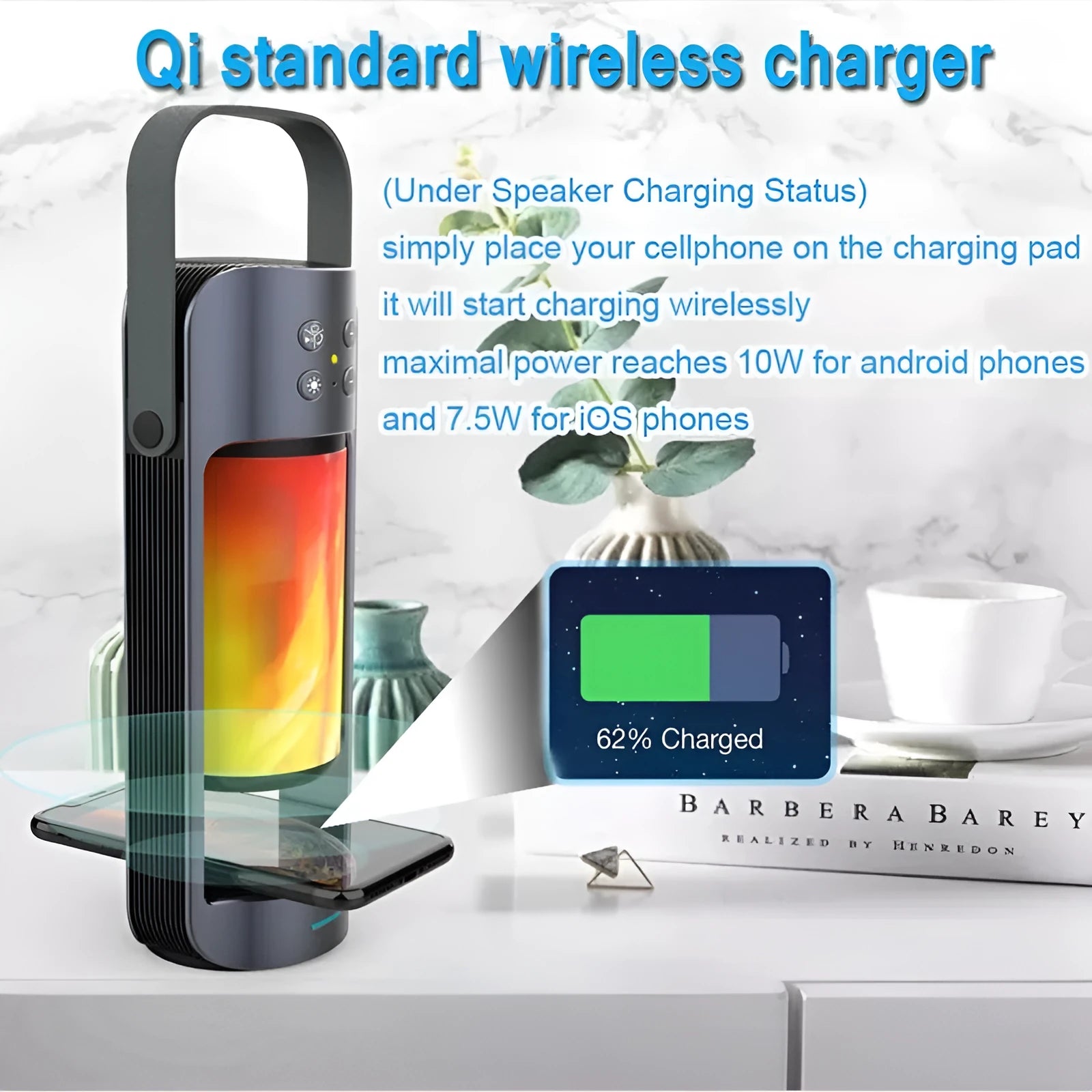 Portable Bluetooth speaker with yellow dancing flame light effect showing wireless charging surface