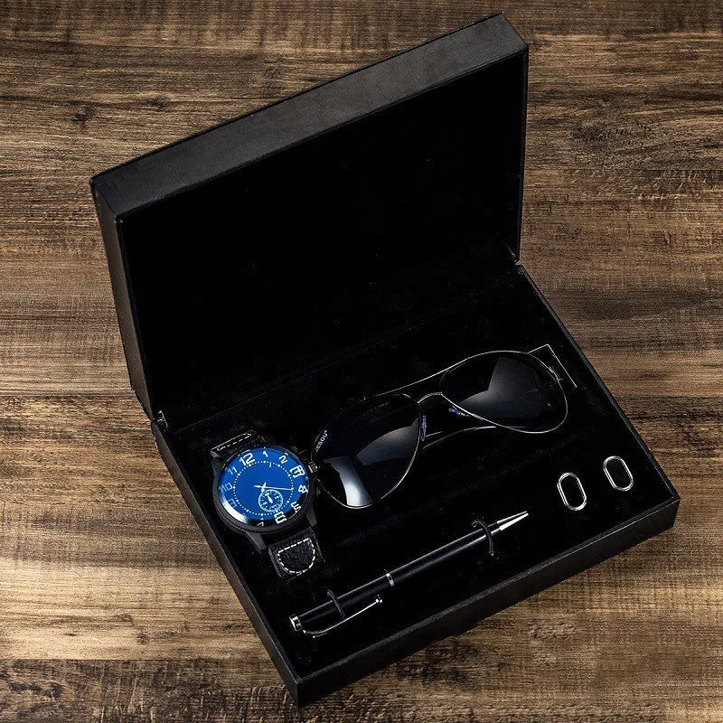 Men's gift set with brown leather watch, sunglasses, pen, and cufflinks in a gift box
