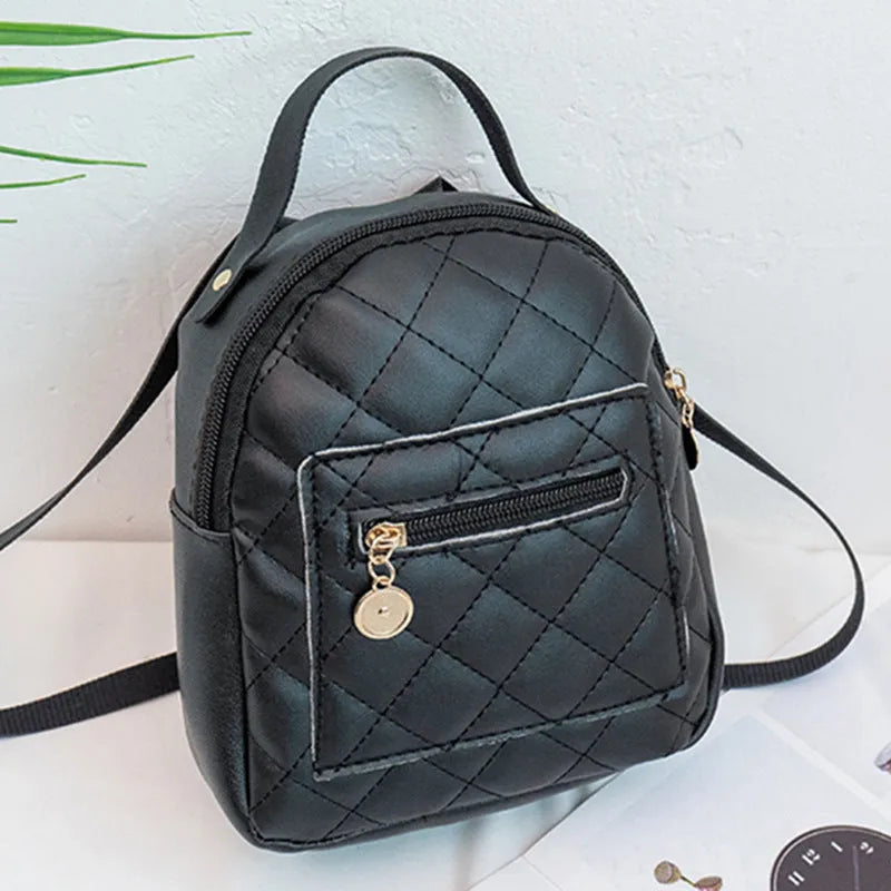 Girls' embroidered Korean style small hard backpack in black, shown with sandwich pocket.