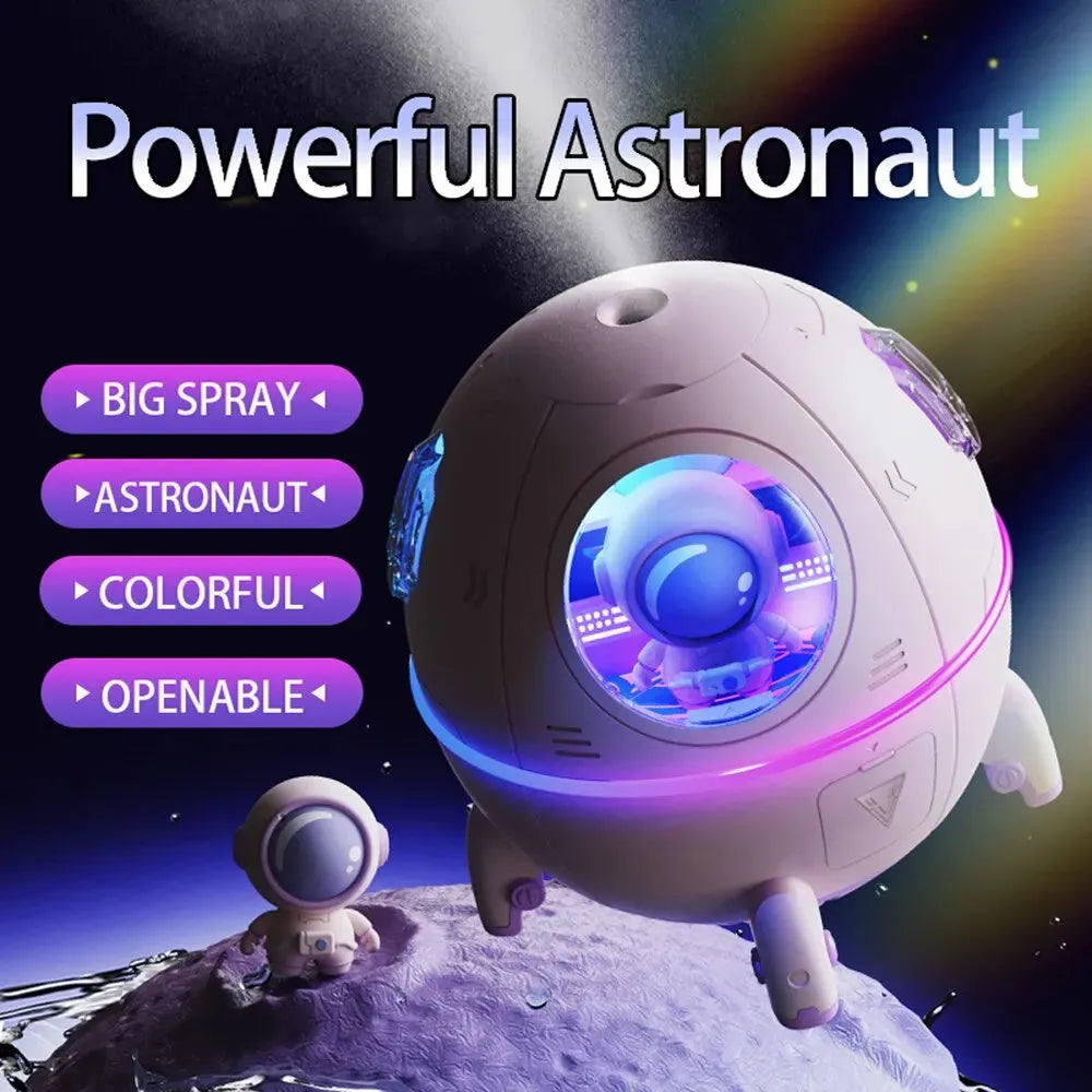 Astronaut-themed desktop USB humidifier with colourful LED light on a desk