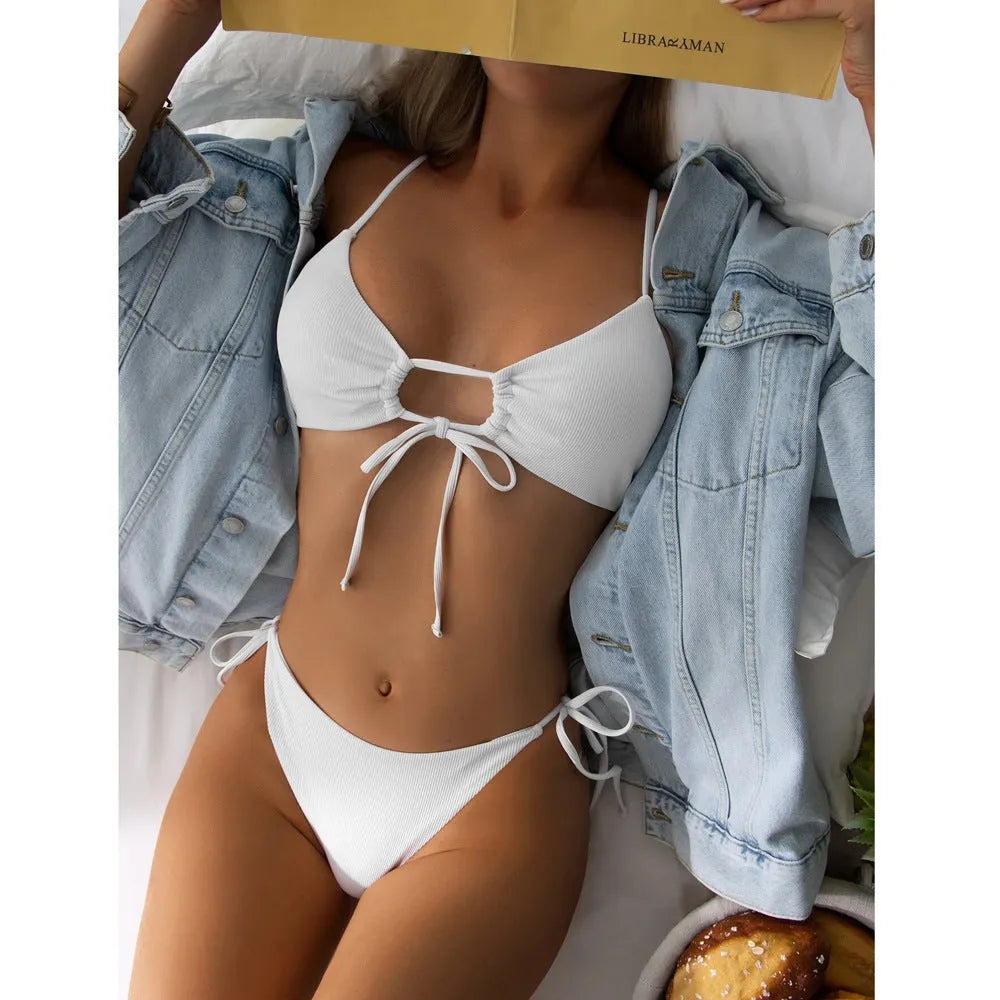 Women's solid colour drawstring bikini swimsuit in quick-dry fabric.