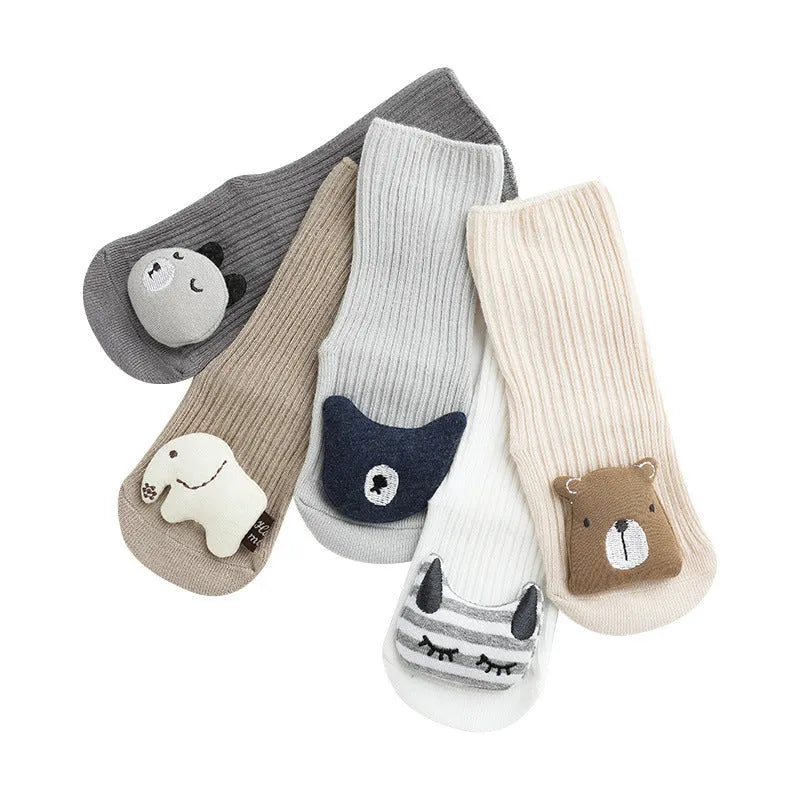 Baby socks with silicone anti-slip grips on sole, mid-height tube design in combed cotton