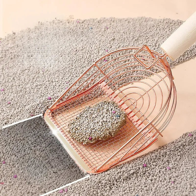 Stainless steel cat litter scoop with a wooden handle for cleaning the litter box.
