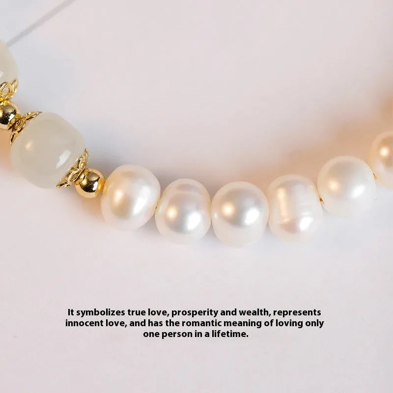 Freshwater pearl bracelet with diamond-shaped pearls in Hetian jade colour on an adjustable chain.