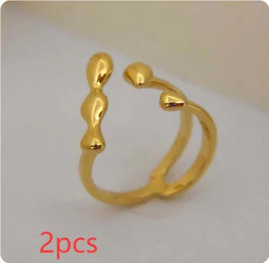 Brass opening ring with spherical elements in gold or silver finish, adjustable women's fashion jewellery