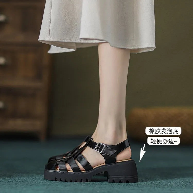 Women's black retro platform sandals with chunky heel, round toe, and adjustable buckle strap.