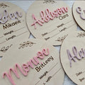 Square wooden baby name label with engraved birth information, 15cm per side.