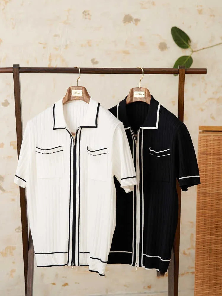 Slim black elastic lapel polo shirt on a hanger, showing short sleeves and knit texture.