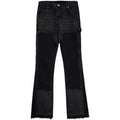 Black micro flared patchwork raw edge jeans on model showing loose straight tube fit