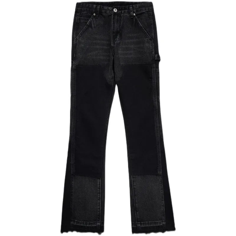 Black micro flared patchwork raw edge jeans on model showing loose straight tube fit