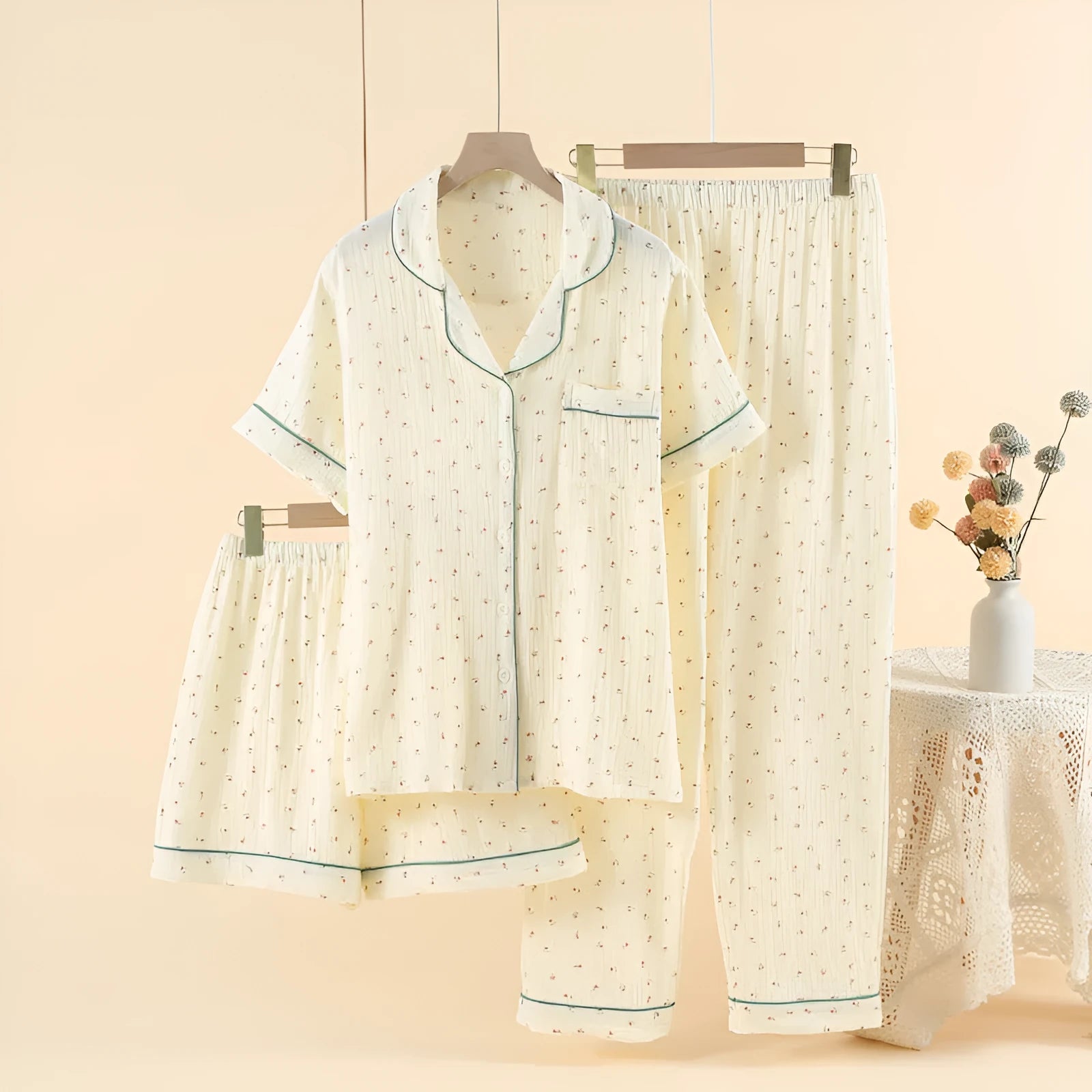 Garden gold women's three-piece cotton pyjama set with lapel top and trousers.
