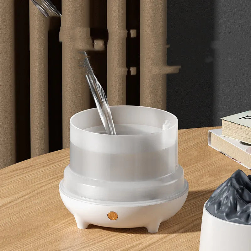 Volcano humidifier with flaming mountain design in black and white colour options