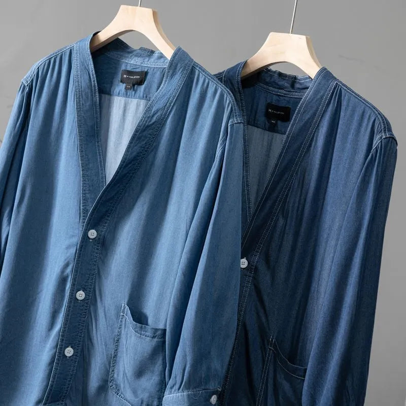 Men's dark blue three-quarter sleeve denim coat with V-neck collar and side pockets