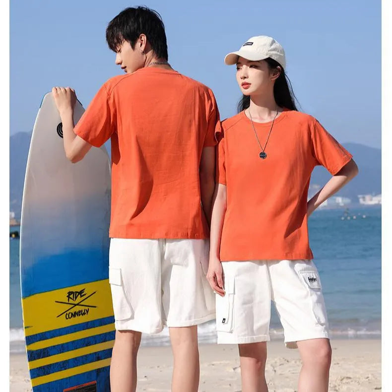 Men's pure cotton straight cut short sleeve t-shirt on a hanger, shown in multiple solid colour options.