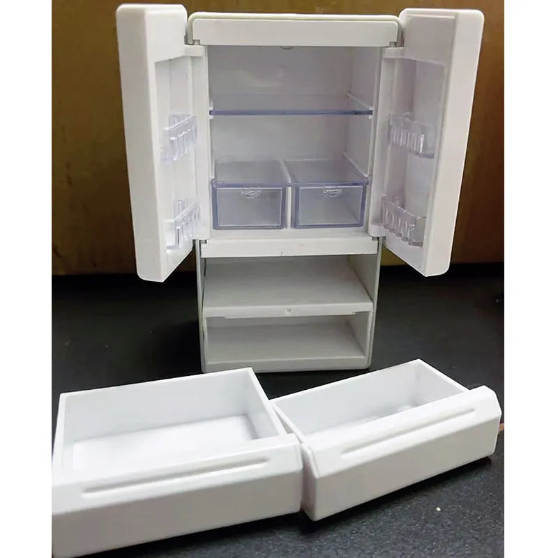 White plastic miniature candy toy model with light-up feature on display.