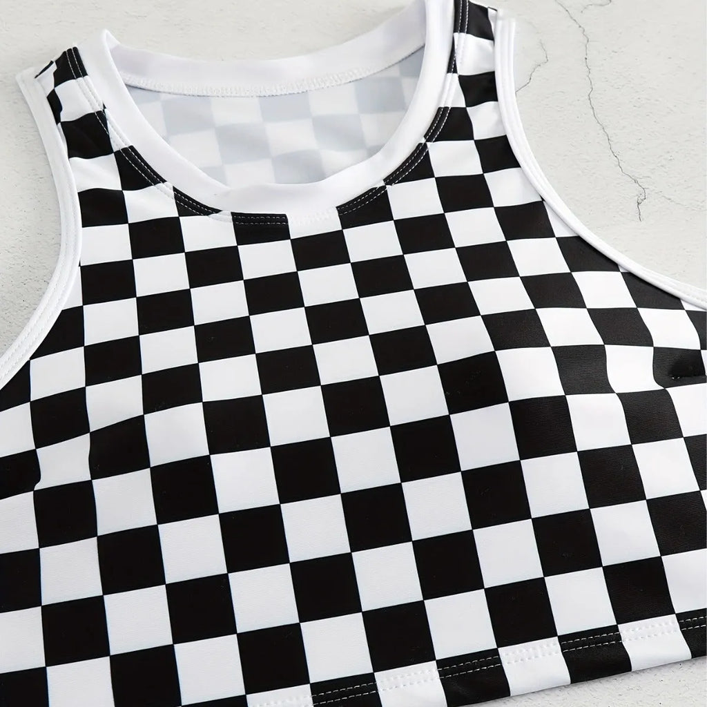 Women's backless racing one-piece swimsuit with suspenders in a black and white chessboard pattern.