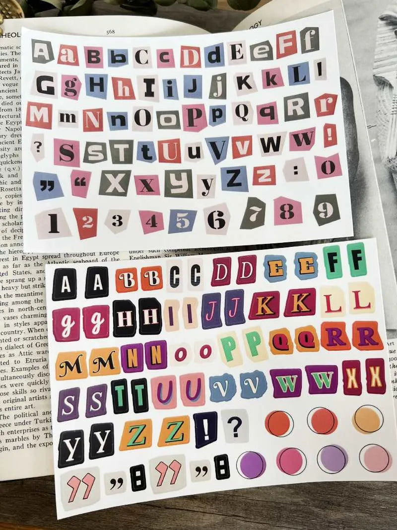 Set of cute style printed decoration stickers showing English letters, numbers, symbols, and weekly words.