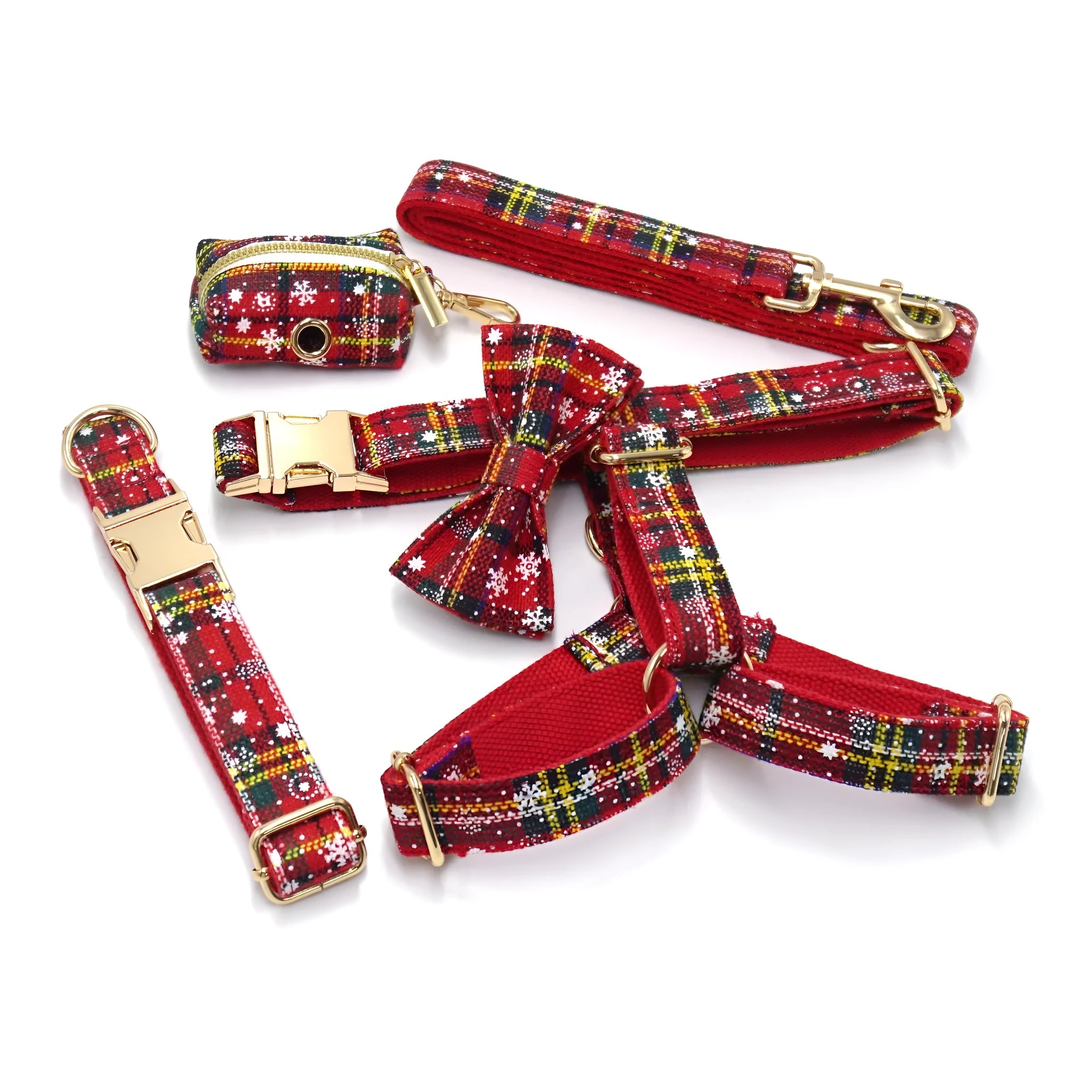 Red Christmas fabric pet collar set with matching harness, rope, bow, and waste bag