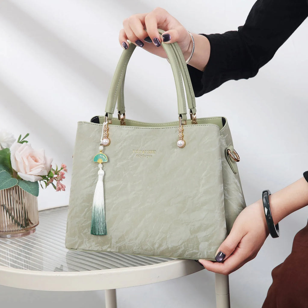 Women's large capacity PU leather handbag in horizontal square shape with outer slit pocket