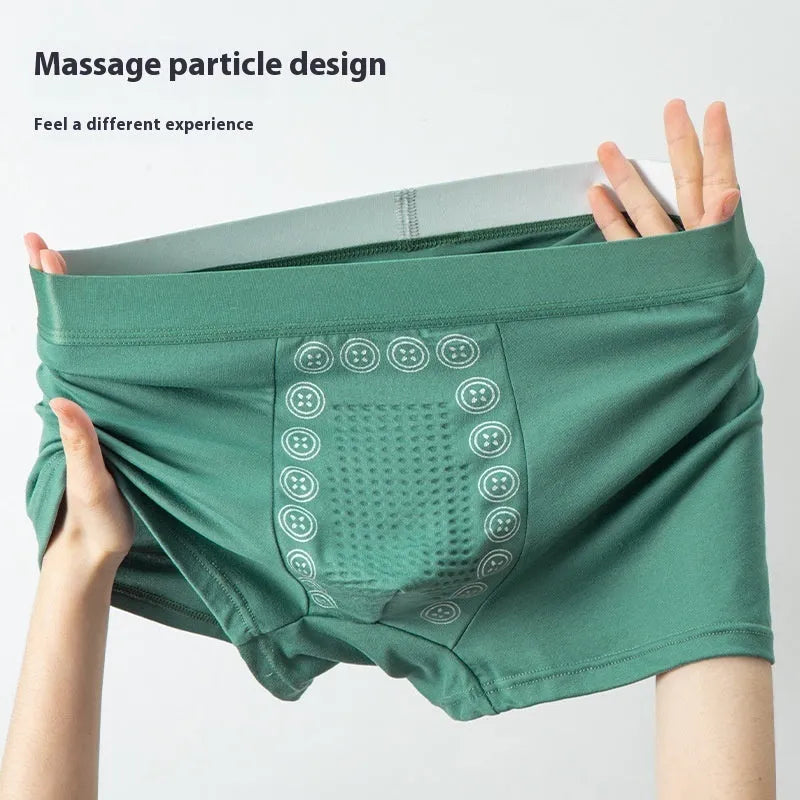 Men's solid colour underwear with massage particles in milk silk fabric showing mid waist design