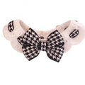 Black and red houndstooth patterned wool dog collar with a metal buckle closure on a white background.