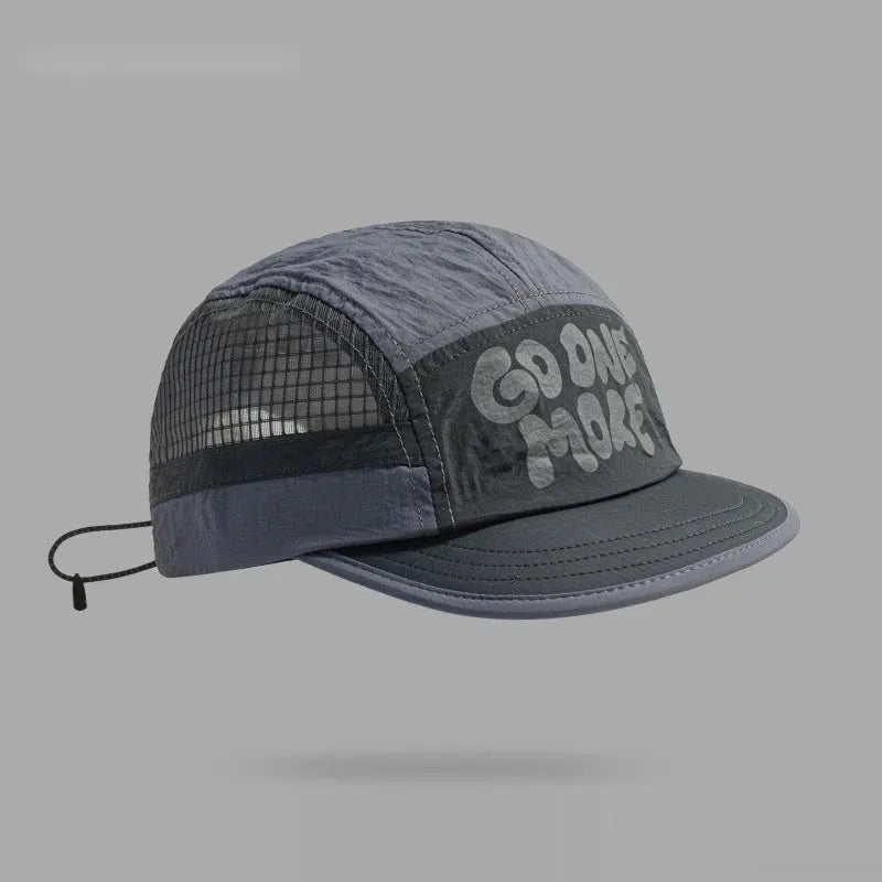 Gradient coloured quick-drying mesh baseball cap with dome crown and printed detail.