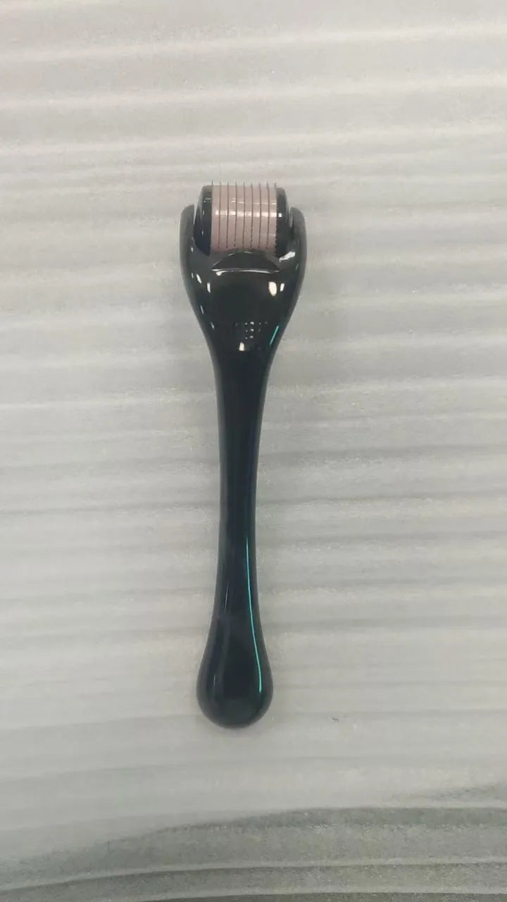 540 micro needle mechanical derma roller with black handle and coloured wheel options