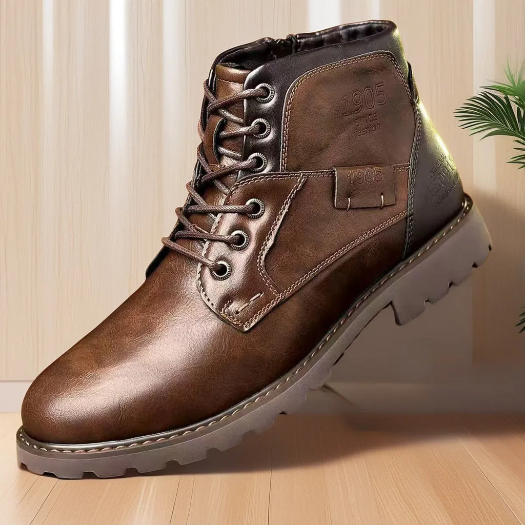 Men's brown ankle boots with side zip fastening and round toe design on rubber sole