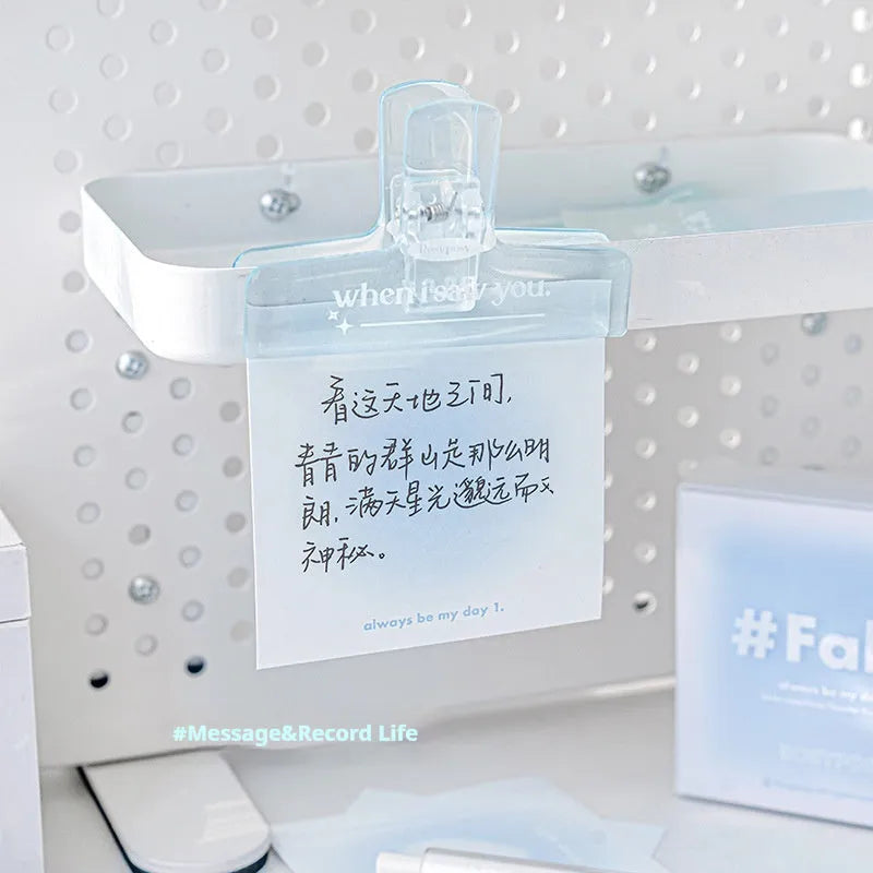 Square multifunctional notepad with gradient parchment paper, sticky notes, and plain pages in blush, green, blue, and purple colour options