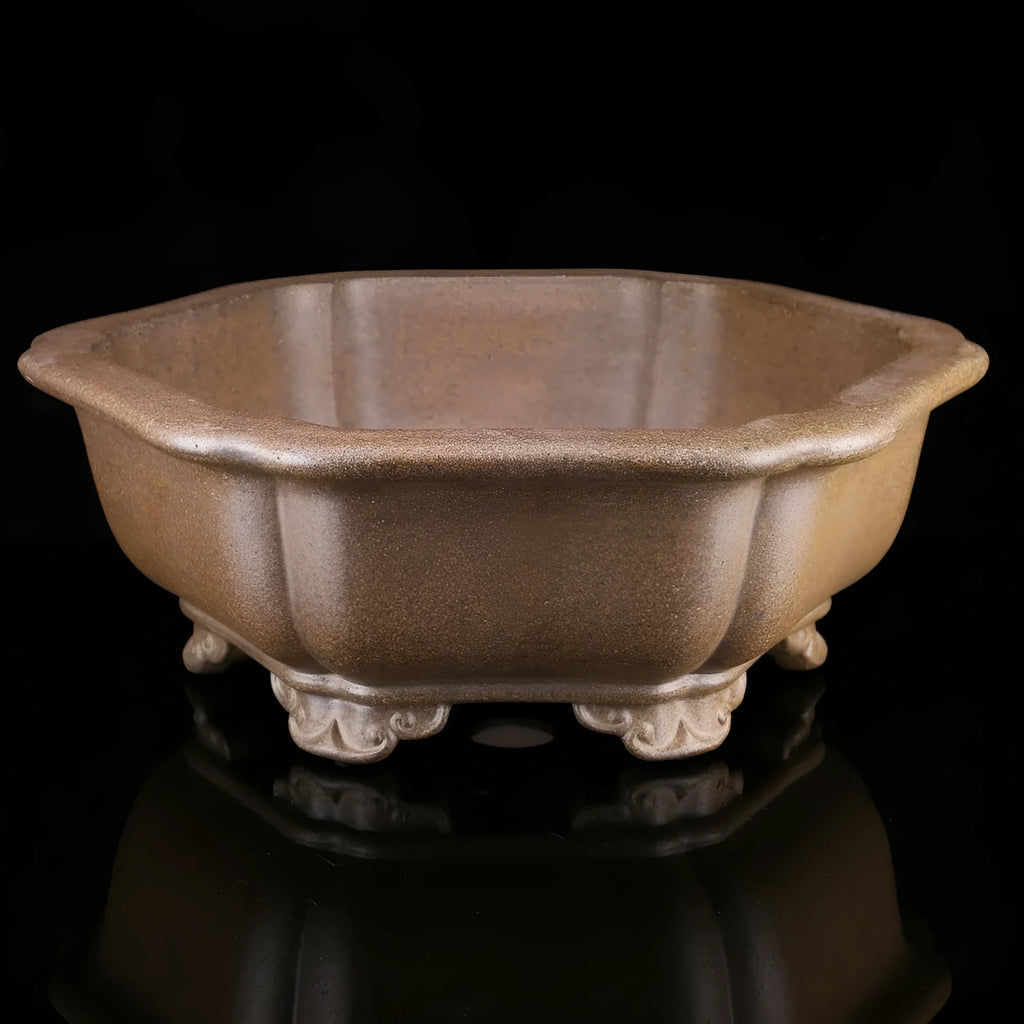 Handmade purple sand tea basin crafted from Pinus taiwanensis firewood clay in hexagonal or begonia styles