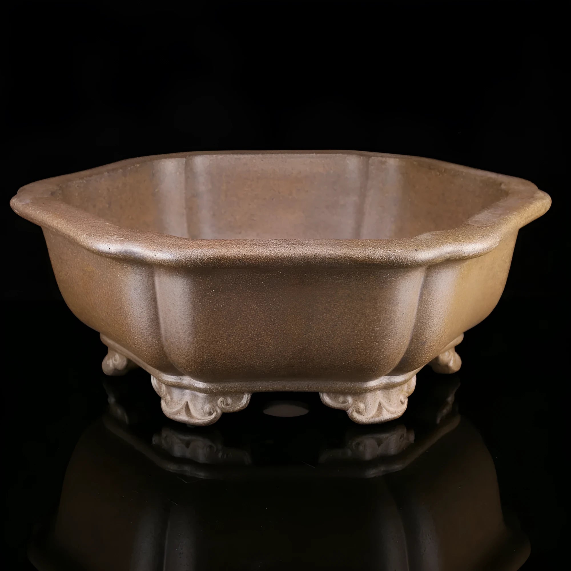 Handmade purple sand tea basin crafted from Pinus taiwanensis firewood clay in hexagonal or begonia styles