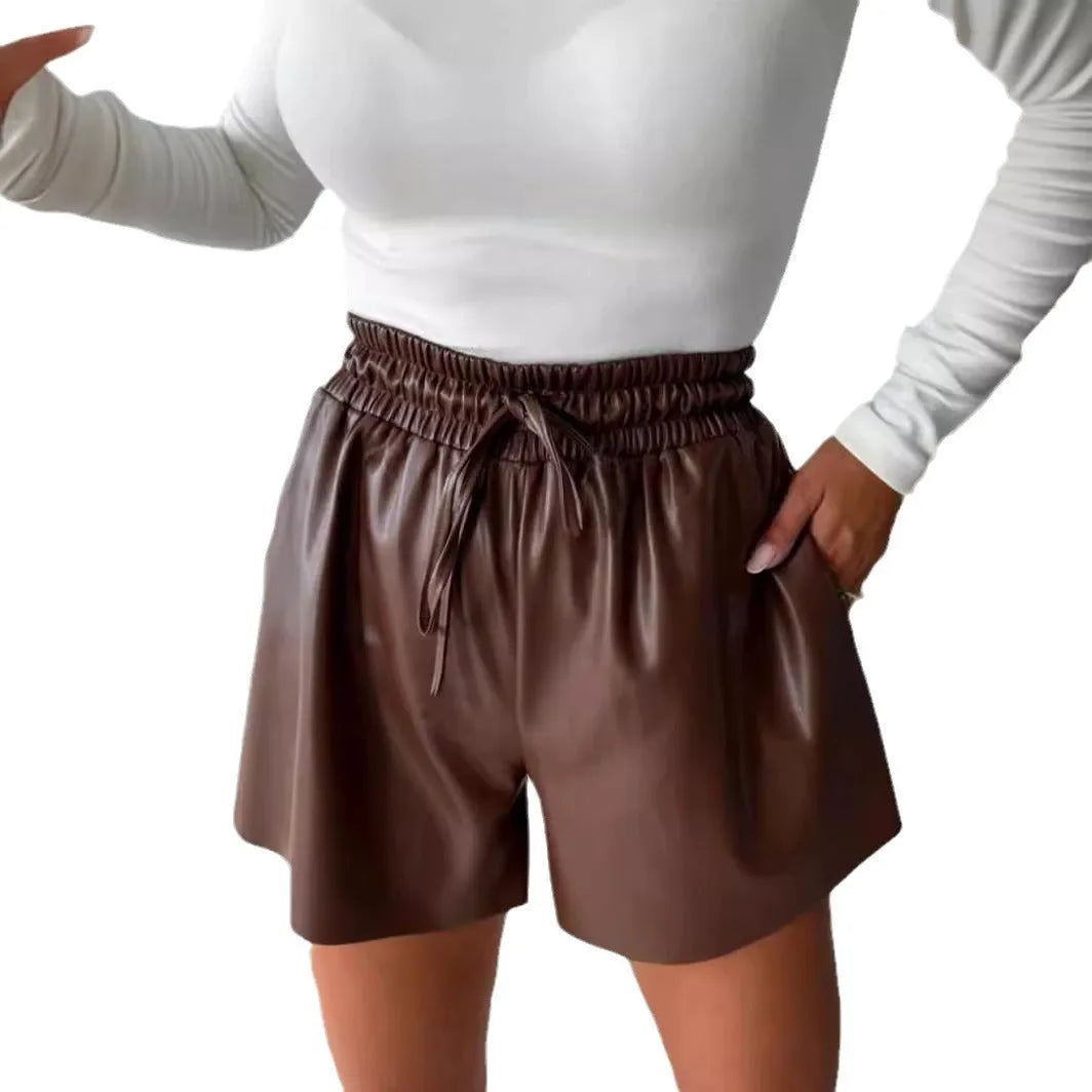 Women's black wide-leg shorts with drawstring lace-up waist detail and straight silhouette