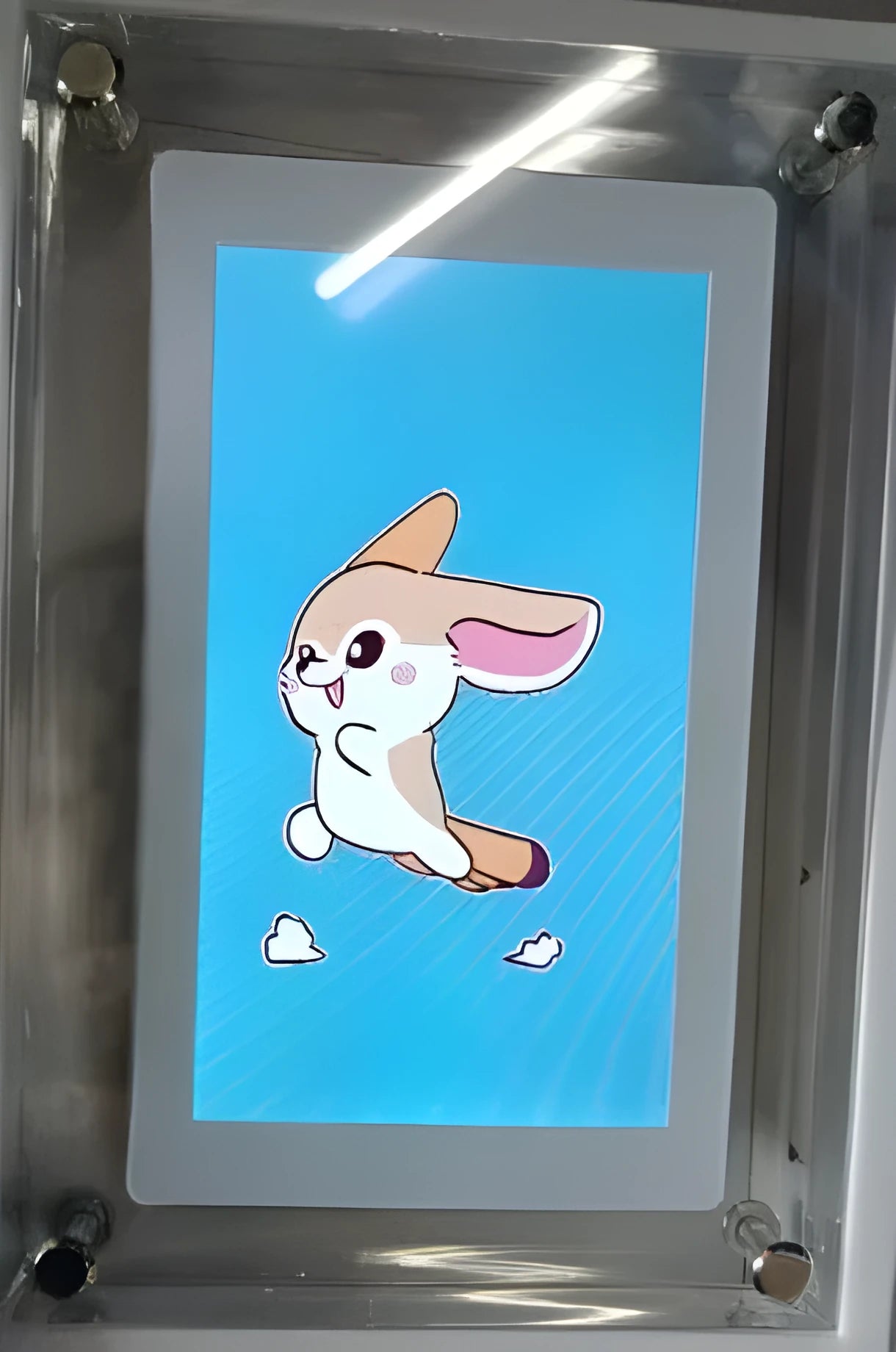 White acrylic digital picture frame with 5 inch vertical screen on a table