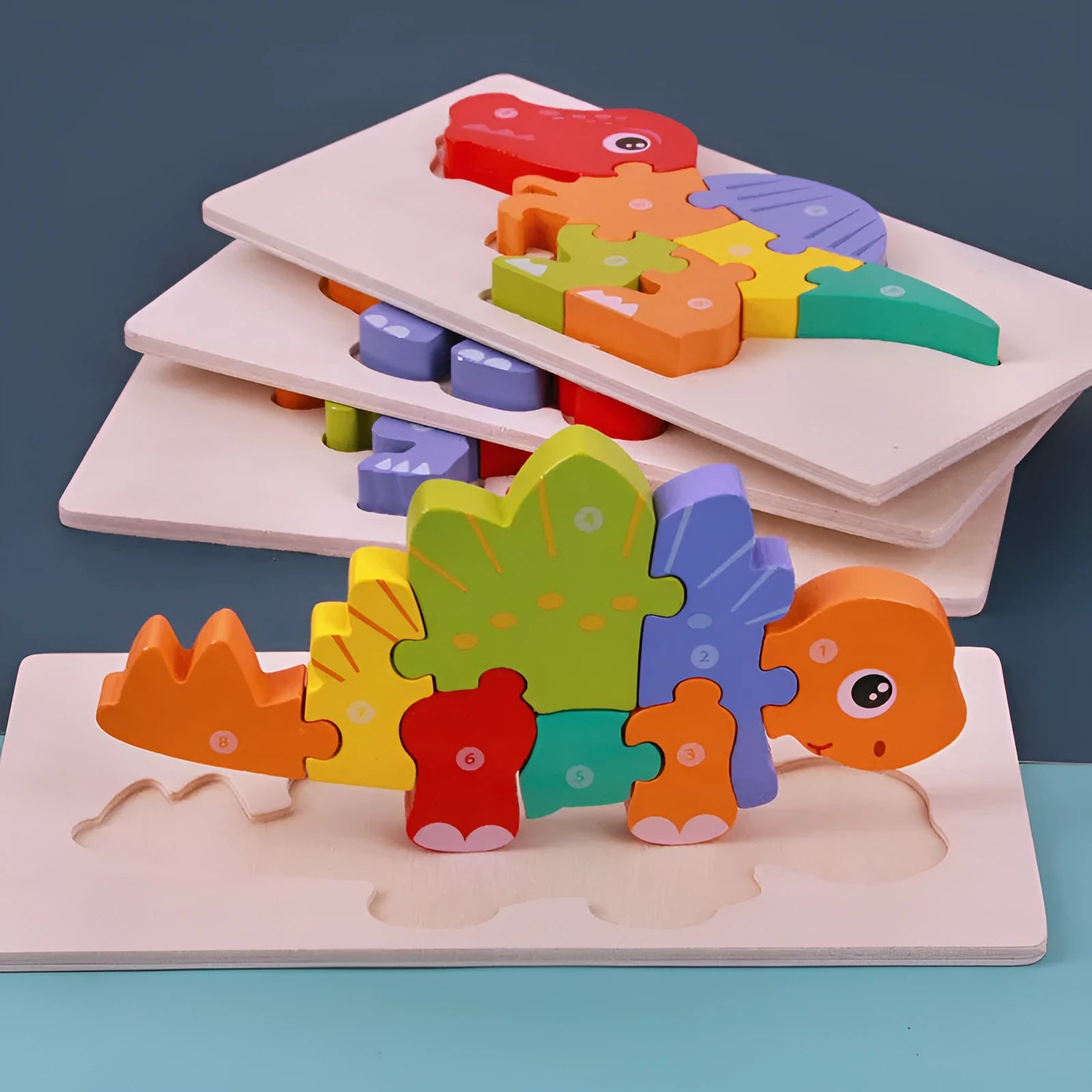 Wooden dinosaur 3D puzzle building blocks for children showing six dinosaur models.