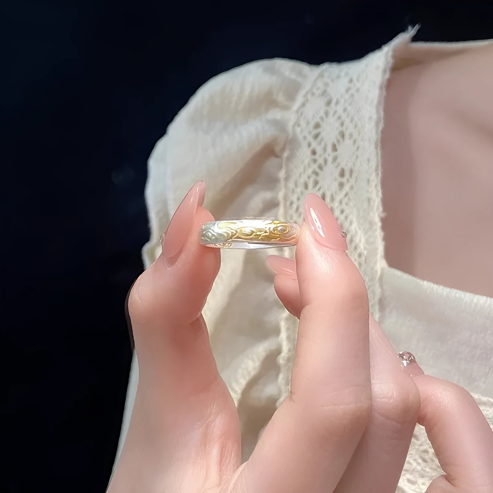 Open mouth silver gold ring with geometric Chinese Xiangyun cloud pattern.