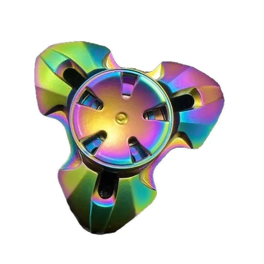 Metal alloy decompression toy with a rotating gyro, shown in gun colour and colourful options.