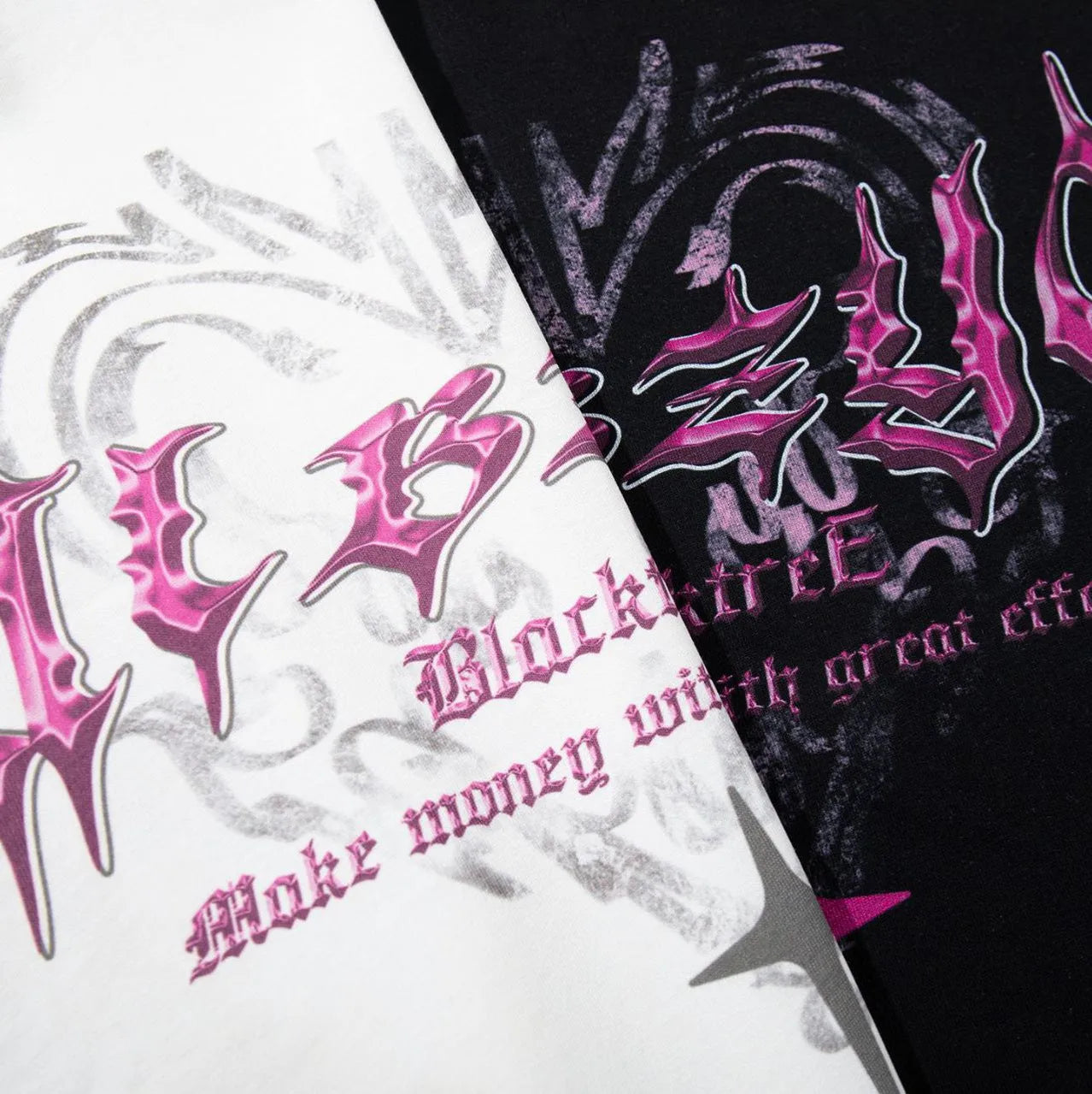 Man wearing a black loose-fit cotton T-shirt with a retro printed design on the front.