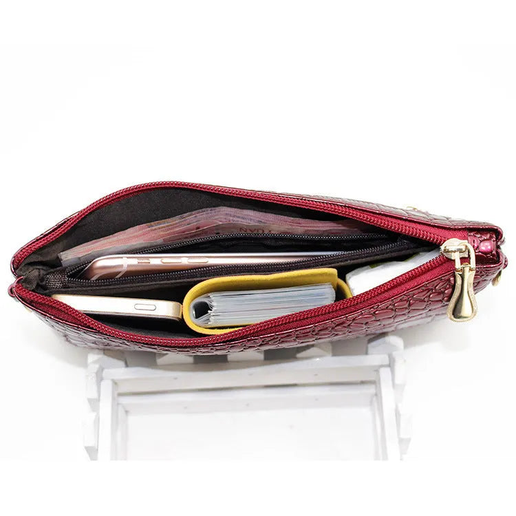 Soft black PU leather women's messenger bag with square shape on a shoulder strap