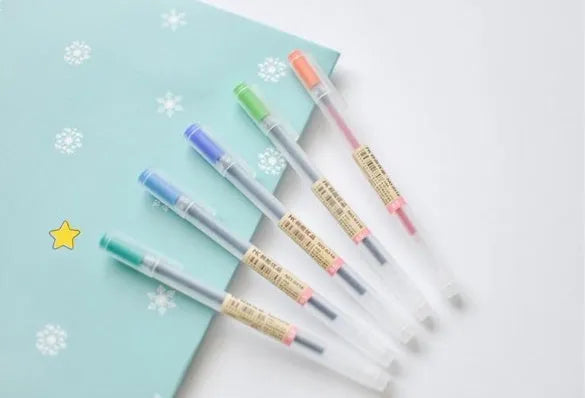 Set of 12 Muji gel pens with 0.5mm fine tips on a white background.