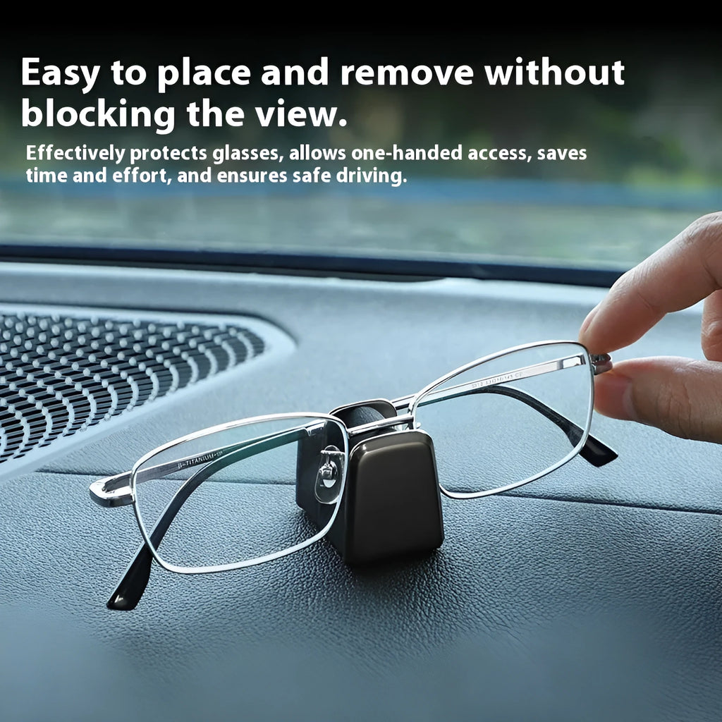 Zinc alloy and leather glasses clip for car dashboard in black, grey, green, or red.