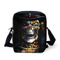 A medium-sized black children's messenger bag with a white skull print, showing double shoulder straps and a front zipper pocket.