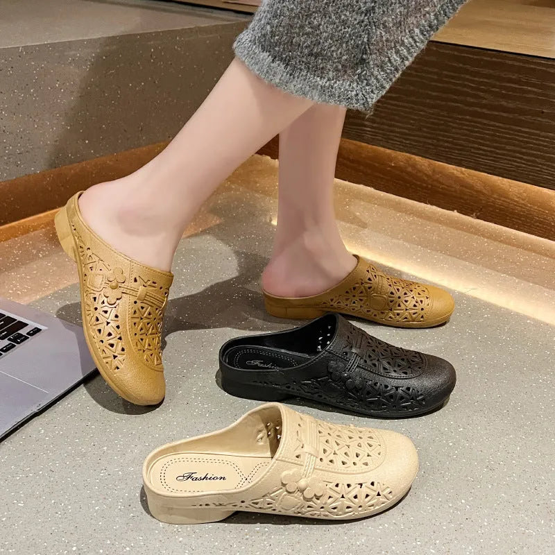 Adult flat toe box slippers in PVC with hollow-out design and faux fur collar.