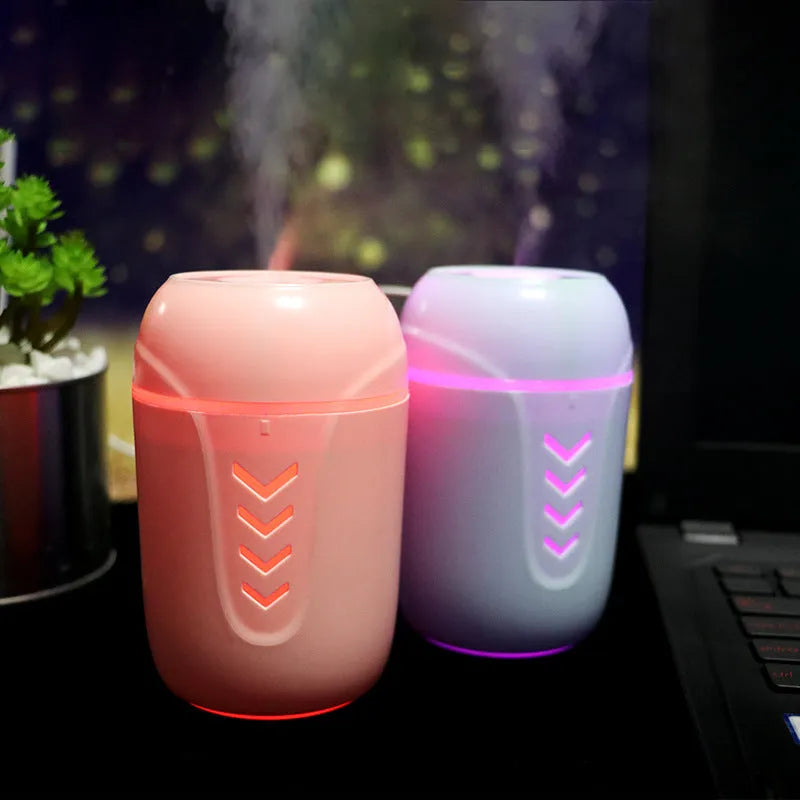 Blue columnar portable car humidifier with USB cable and aromatherapy function.