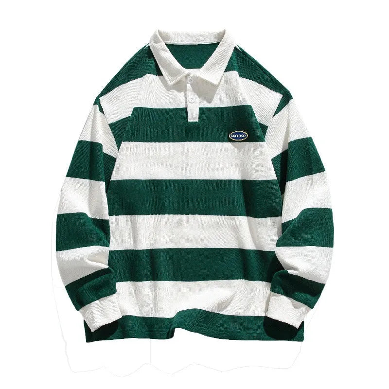 A man wearing a loose-fit, striped pearl cotton polo shirt with a lapel collar and long sleeves.