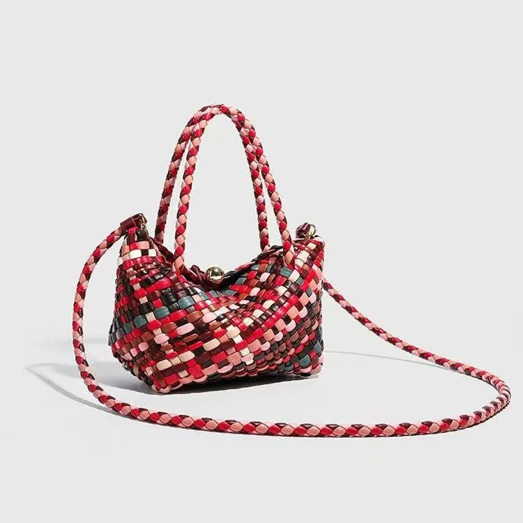 Women's casual woven PU leather shoulder bag showing handmade texture and shoulder strap.